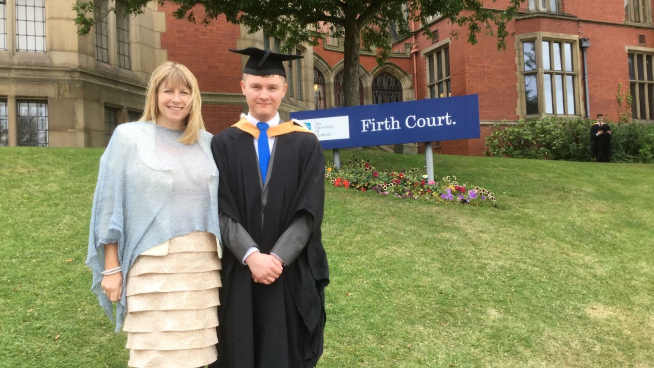 Jo with her son Liam on his graduation day
