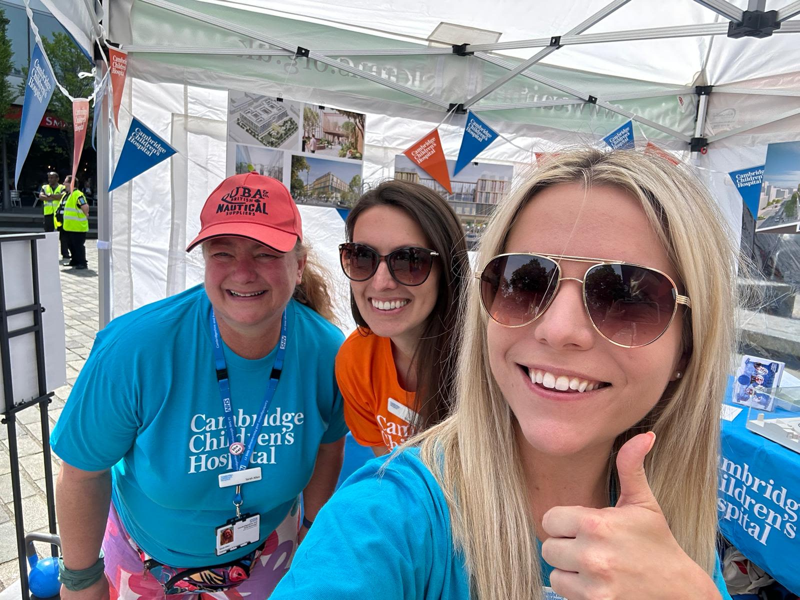 Three women smiling at the camera